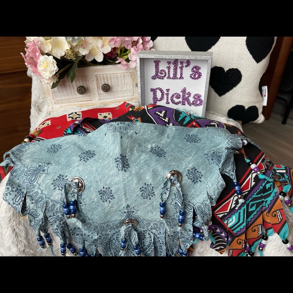 S O L D of scarfs with beads.